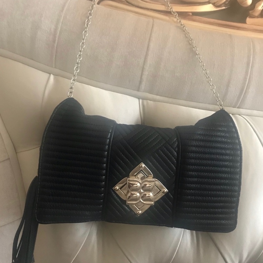 Like new BCBG MaxAzria black and gold chain bag